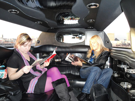 PMG Kat and Clarissa check out limo reading material on the way to Affiliate Summit